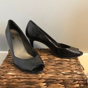 Black open- toe heels with faux snake skin design